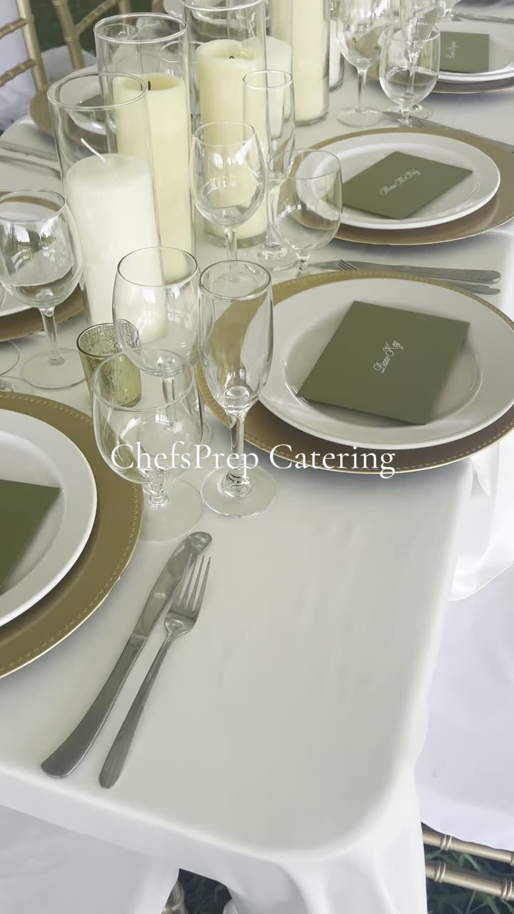 Guests gathering at a tented wedding reception catered by ChefsPrep Catering
